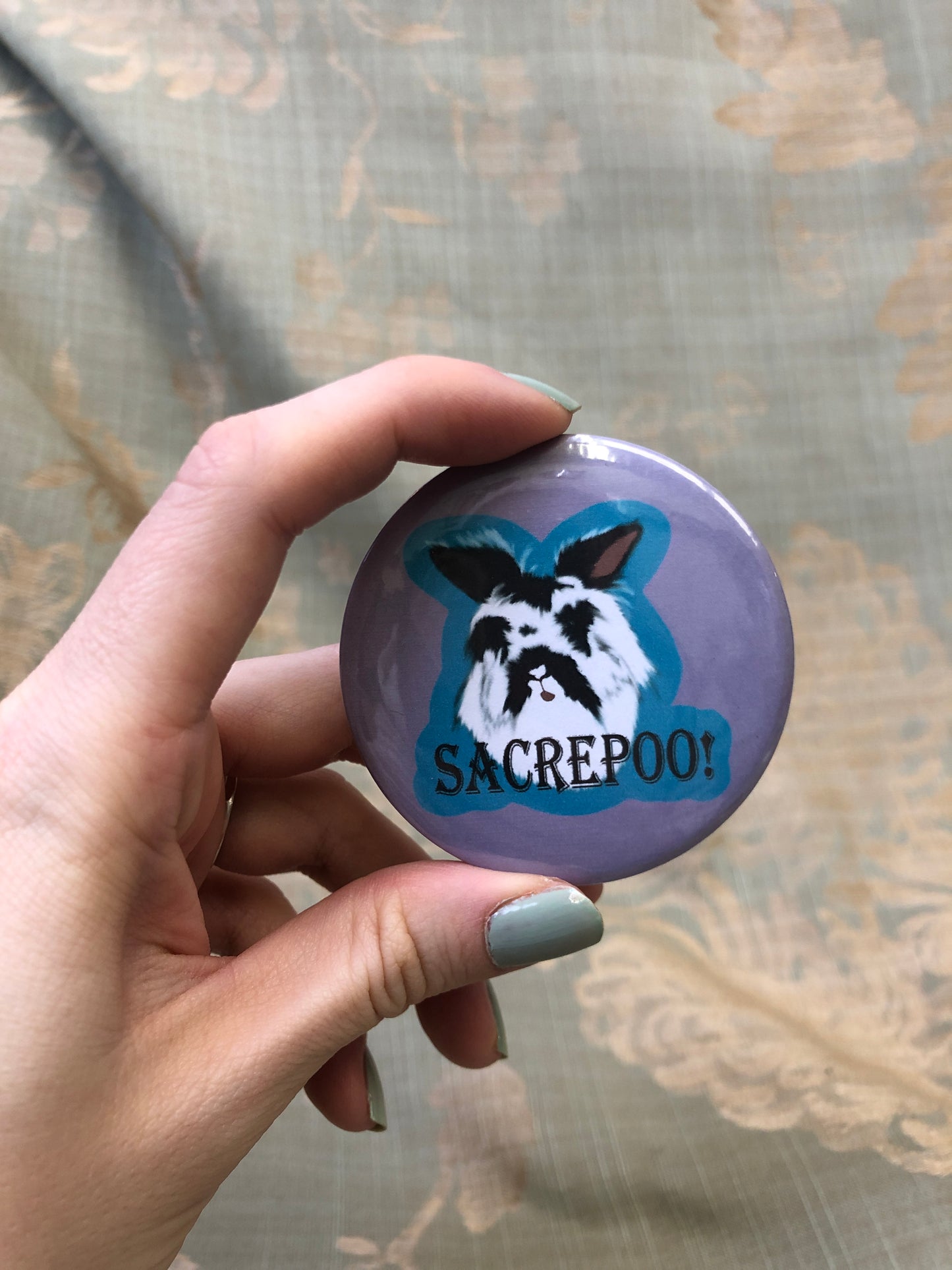 Sacre-Poo | Badge