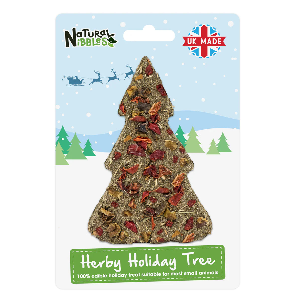 Hay based treat for rabbits shaped like a Christmas tree on a branded packaging with 'Natural Nibbles' logo.