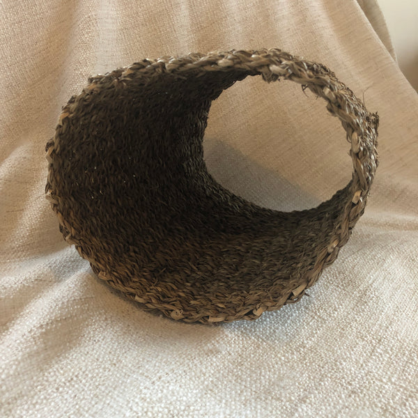 Rosewood rabbit tunnel made of seagrass and rattan, large size looking through it.