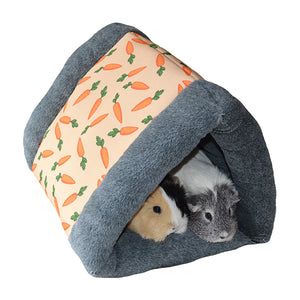 Two cosy little guinea pigs (a grey and white one and a tan, white and black fluffy one) peek out from a rosewood snuggle 'n' sleep tunnel for rabbits (but suitable for other furries).